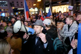 An estimated 1,000 demonstrators marched through Prague protesting against lockdown restrictions imposed by their government. (photo: James Fassinger)