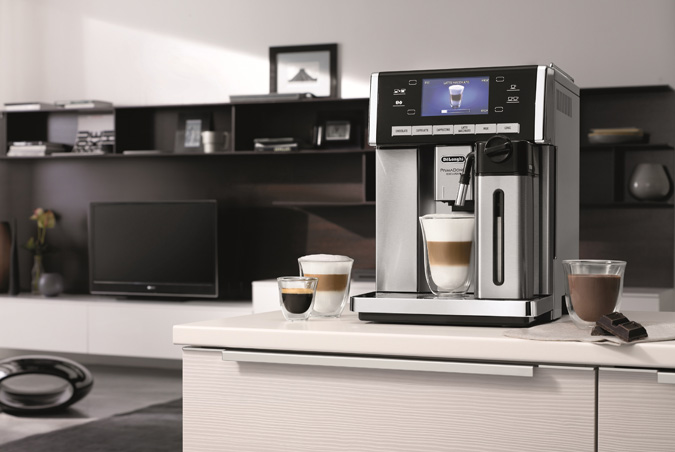 DeLonghi PrimaDonna Exclusive ESAM 6900, first coffee maker making hot chocolate