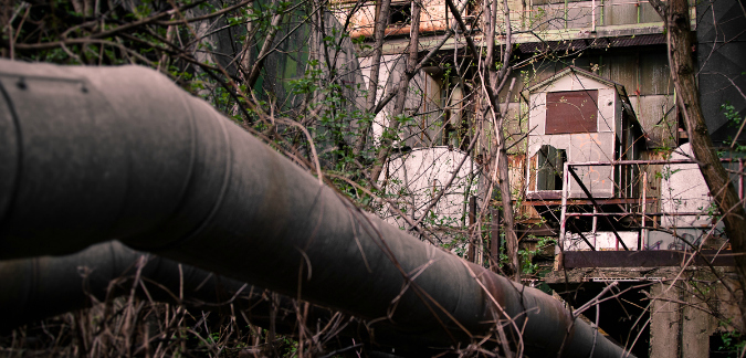 An overgrown teplárna, or electrical plant