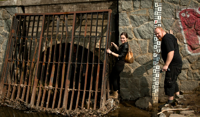 Urban explorers slip into the tunnel