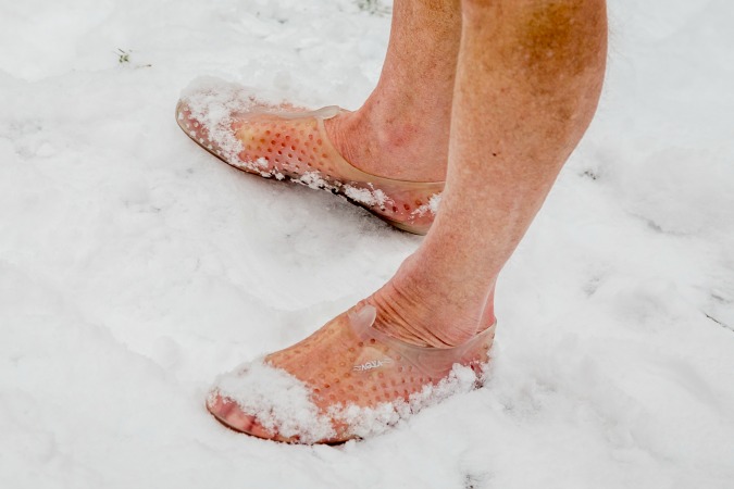 PHOTOS: Brrr! First Dip Of the Year for Prague Tough Swimmers’ Club