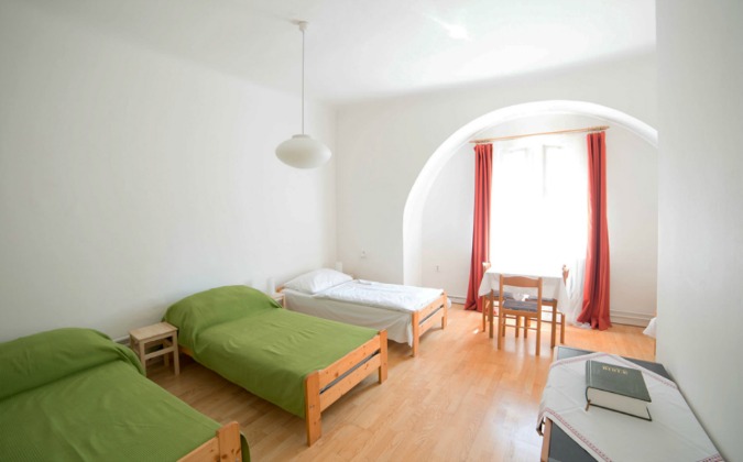 A room at the Dominican Priory / hostel.op.cz