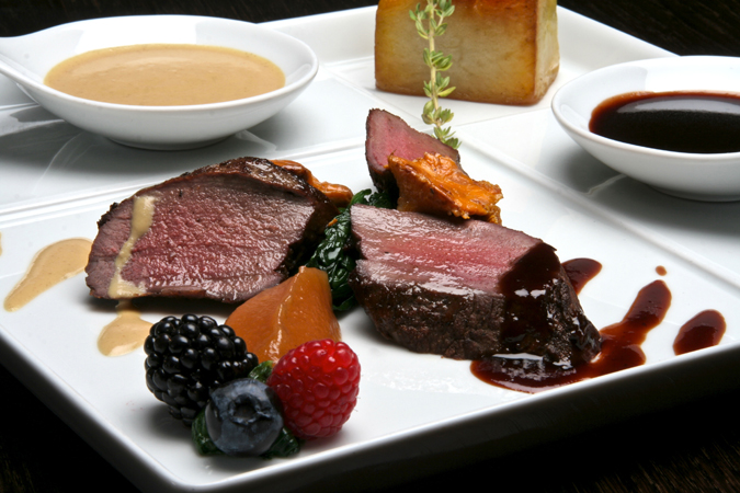 Roe Deer Back with Chanterelle and Foie Gras Potato Fondant topped with Forest Fruit Sauce