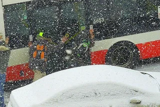 Praguers Push Bus Up Hill During Snowstorm