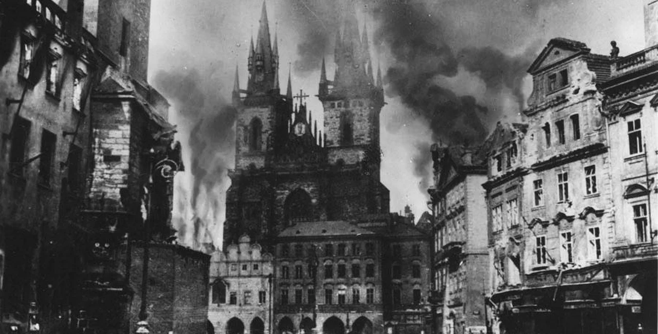 Prague’s Old Town Square in flames during Prague Uprising in May, 1945 (via Prague City Archives)