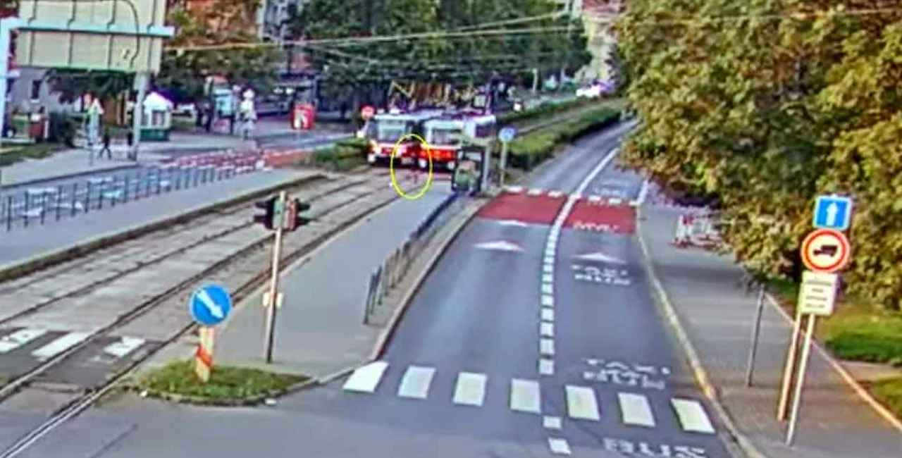 A boy walks in front of a tram in Brno. via Czech Police