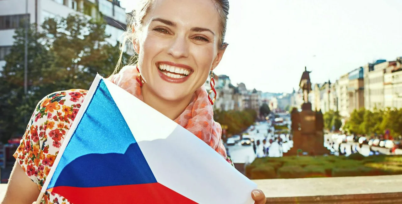 Lady with flag, via iStock