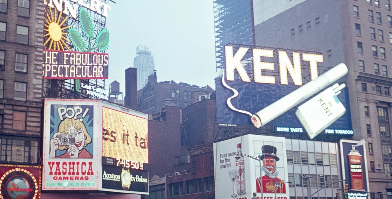 Billboards in New York City's Times Square advertising cigarettes and alcohol in 1968