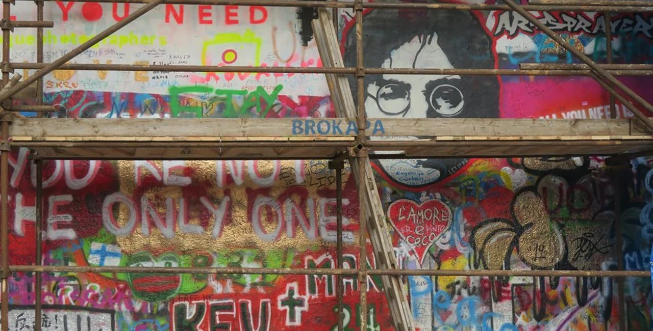 Scaffolding at the Lennon Wall. via Raymond Johnston
