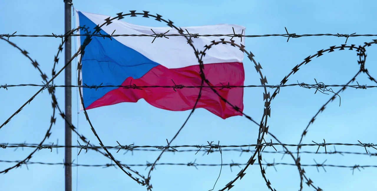 Border of Czech Republic and Czech Flag with barbed Wire