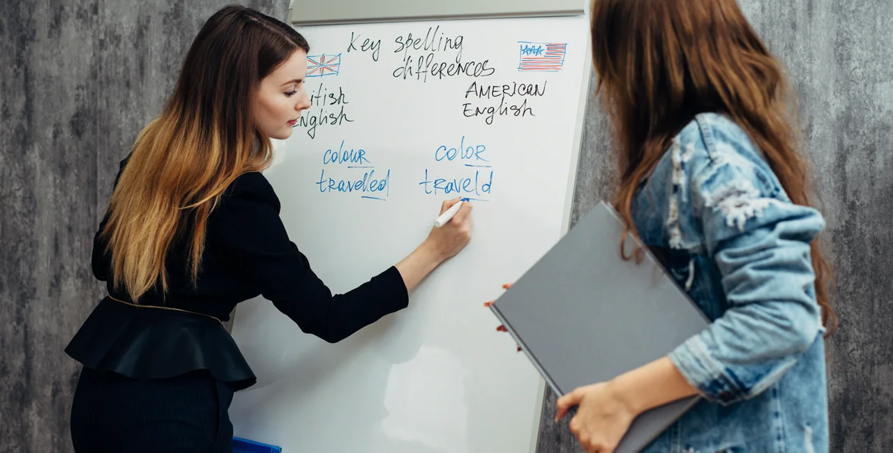 English language school. Lesson, teacher and student talking