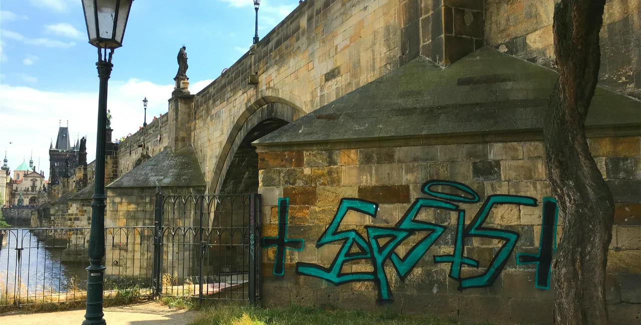 Graffiti on Prague's Charles Bridge via Lucas Němec