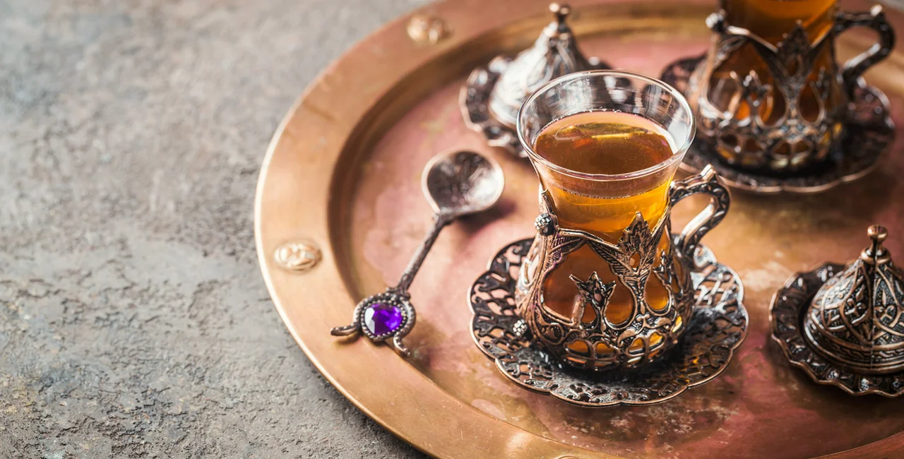 Brewed tea in a glass cup. via iStock