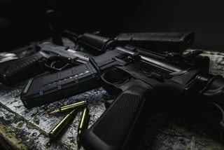 AR-15 rifle with ammunition (illustrative image)