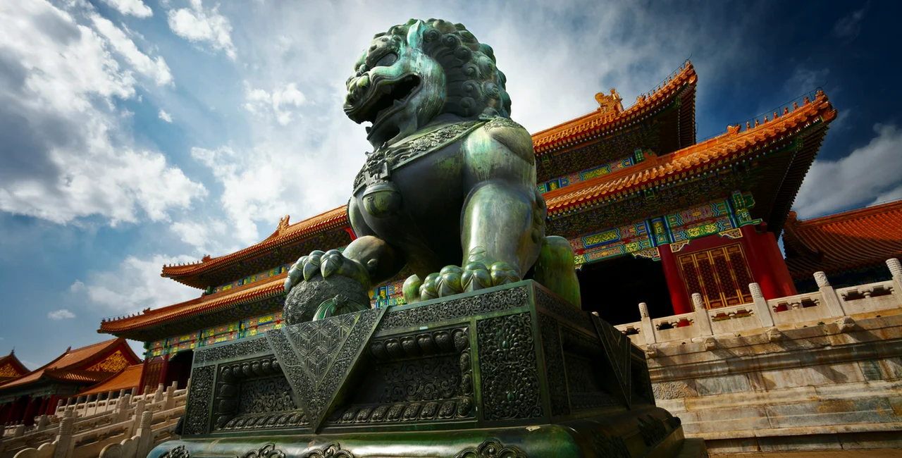 Bronze lion at the Forbidden City in Beijing, China via iStock.com / ithinksky