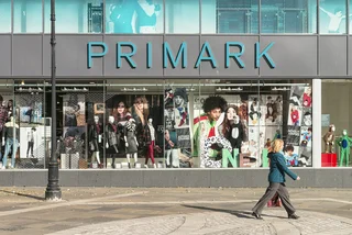 A woman walks past a Primark in Dundee, UK (illustrative image via iStock.com / georgeclerk)
