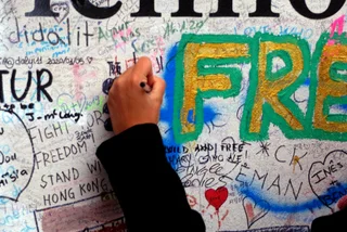 Tourists are still writing on Prague's Lennon Wall, despite the recent ban