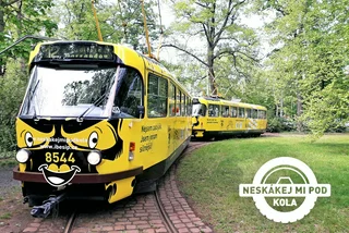Yellow tram with safety warnings. via Neskákej mi pod kola / Facebook