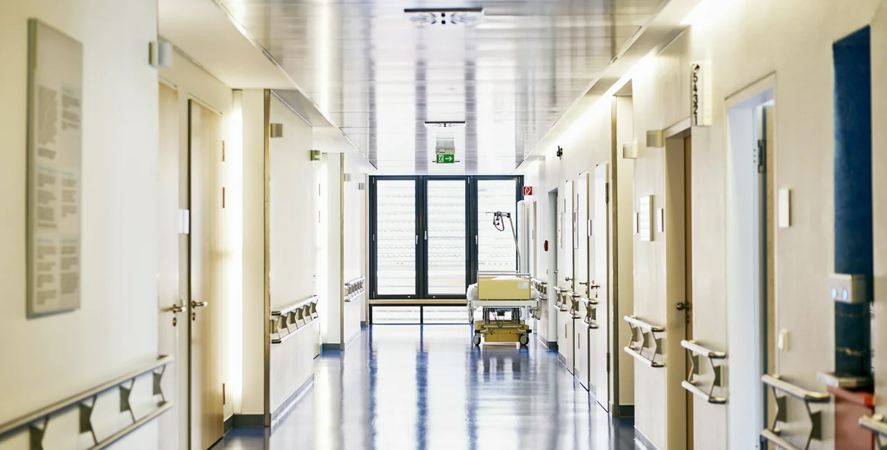 Hospital with corridor and bed. Illustrative photo via iStock/ upixa