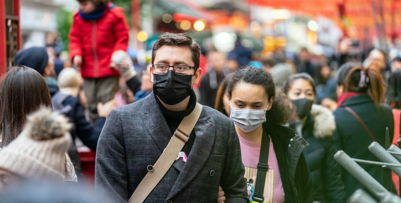 London, January 26, 2020: People wearing protective face masks (illustrative photo via iStock.com / Powerofflowers)