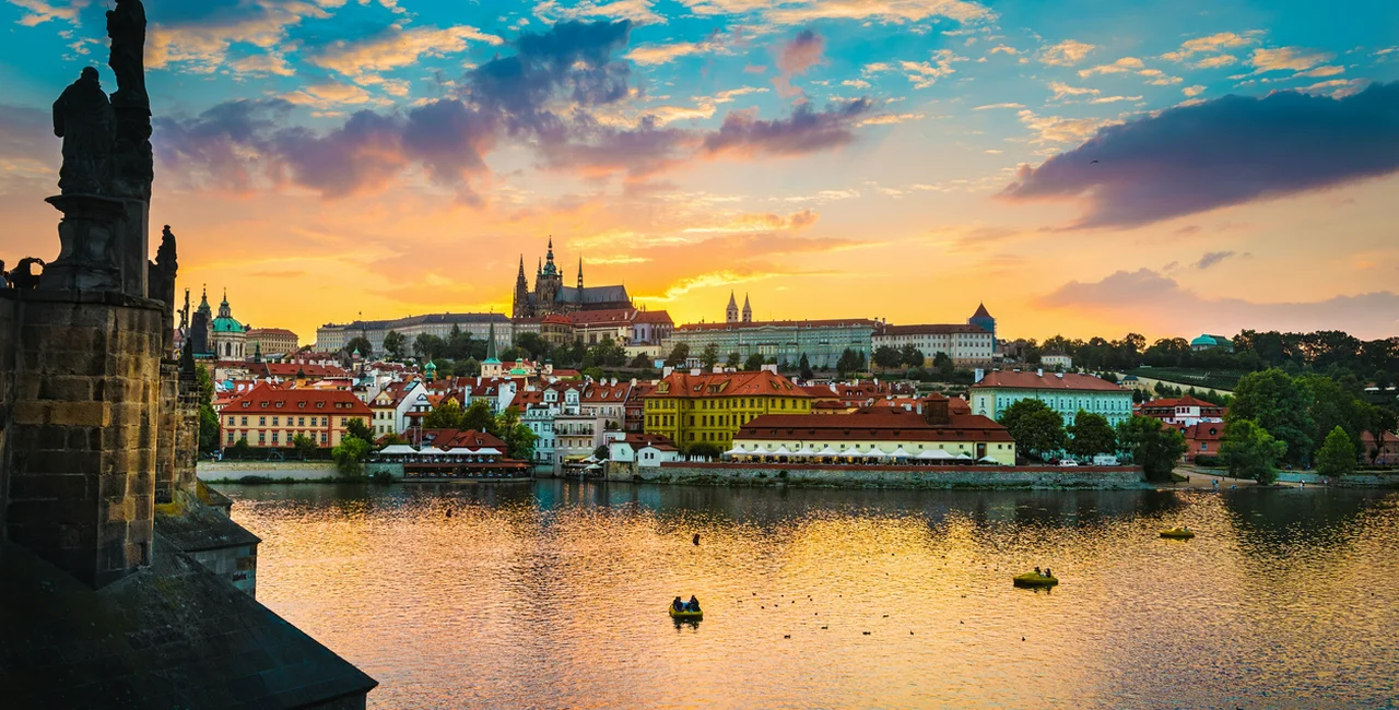 View of a sunset overlooking Prague Castle and the Vltava River