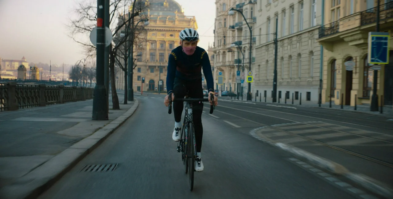 Empty streets of Prague by National Theatre on a bike