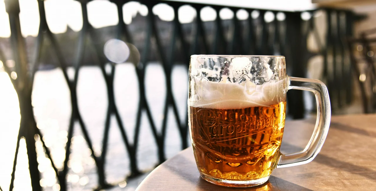A fresh pint of Staropramen beer by the Vltava in Prague via Sonja Maric from Pexels