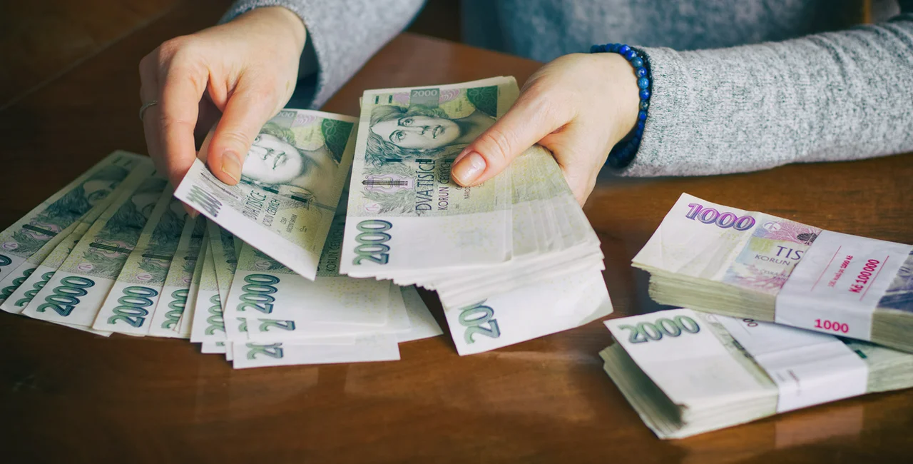 Counting Czech money (Illustrative image)