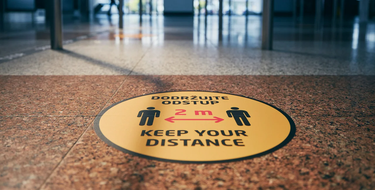 Social distancing sign at Vaclav Havel Airport in Prague