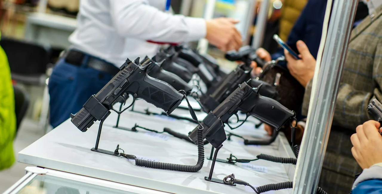 Firearms on display in a gun store via iStock / artas