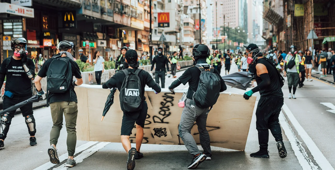 Protesters on the streets of Kowloon, Hong Kong in October 2019 via iStock / Nikada