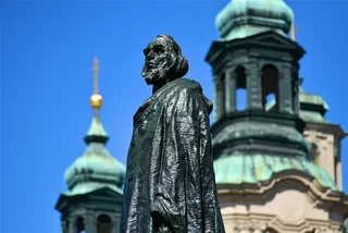 Jan Hus Statue in Prague's Old Town Square via iStock / Olivier DJIANN