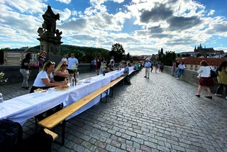 IN PHOTOS: Prague says goodbye to coronavirus with a dinner for 2,000 on Charles Bridge