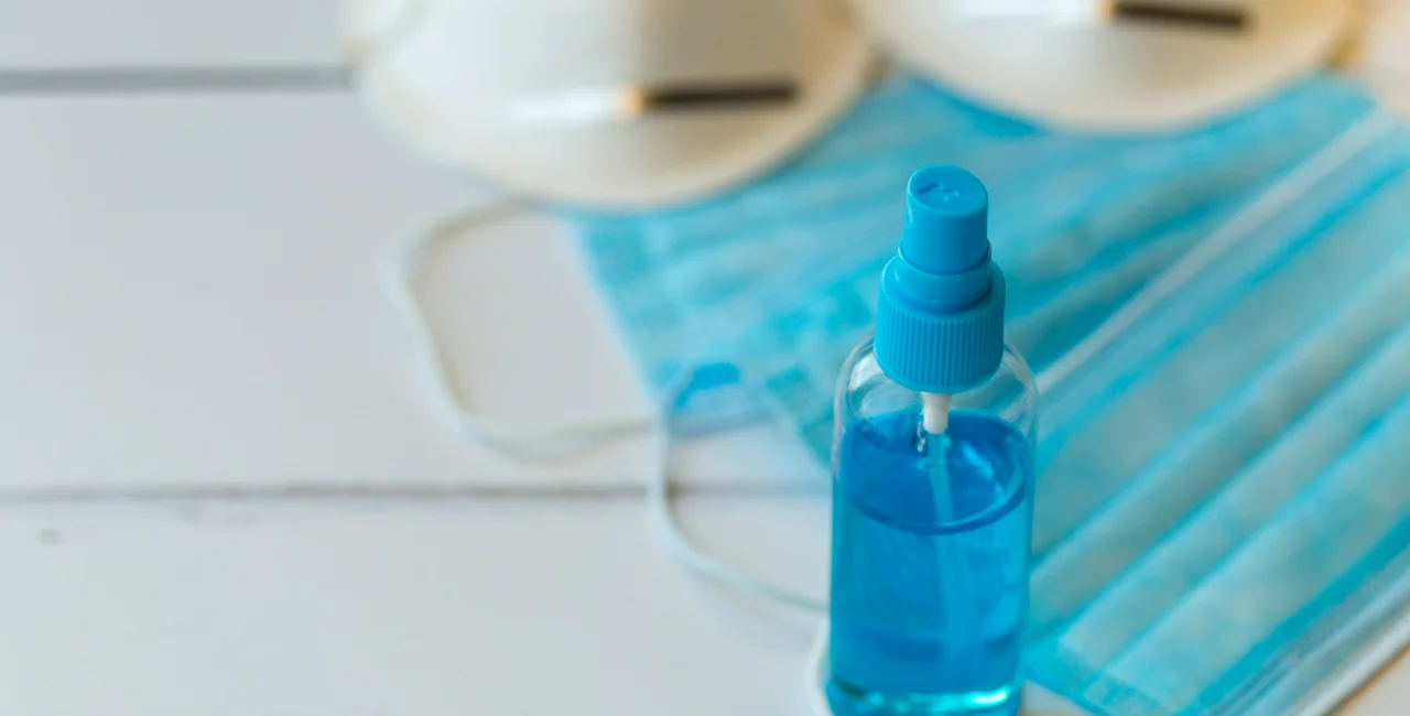 Disinfectant, face masks and respirators via iStock / coldsnowstorm