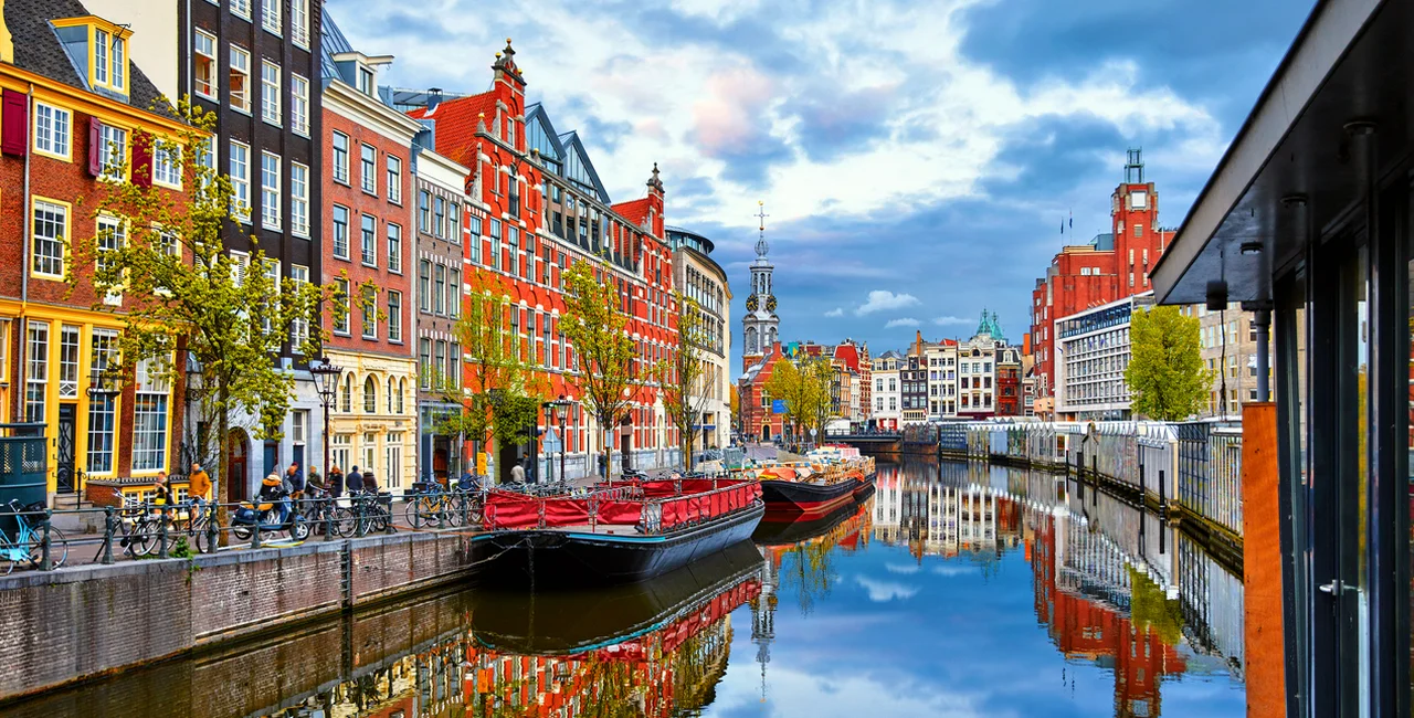 Canal in Amsterdam via iStock / Yasonya