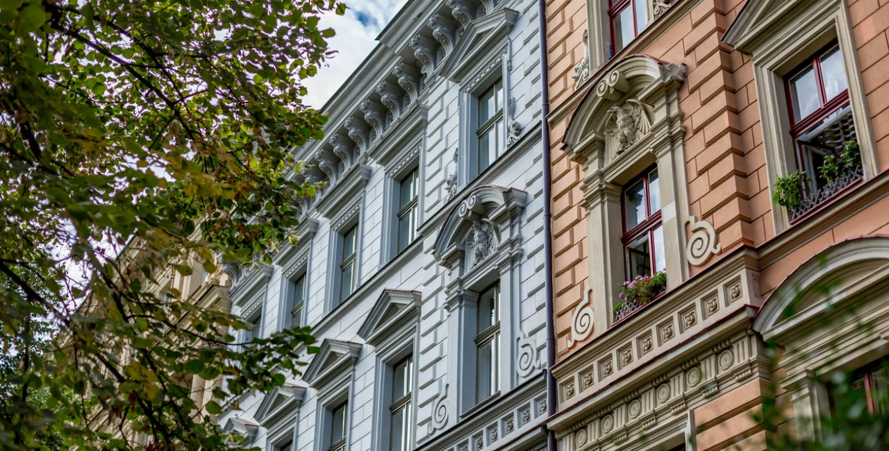 Row of apartment buildings in Prague / via iStock