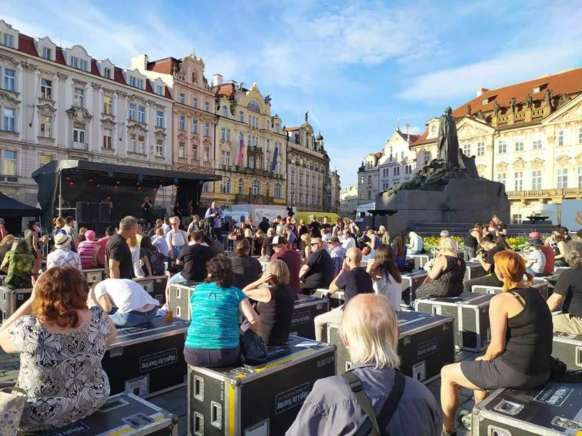 People sitting on containers at the For Live Music rally / via Raymond Johnston