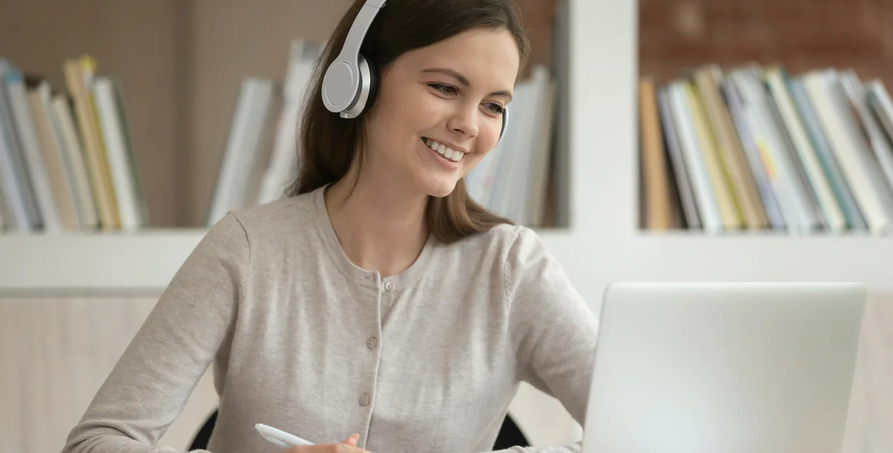 Young woman taking an online course via iStock / fizkes