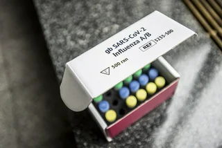 white box of colorful test tubes