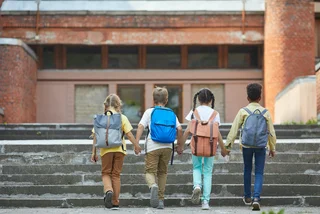 Students walk to school. Photo: iStock/SeventyFour