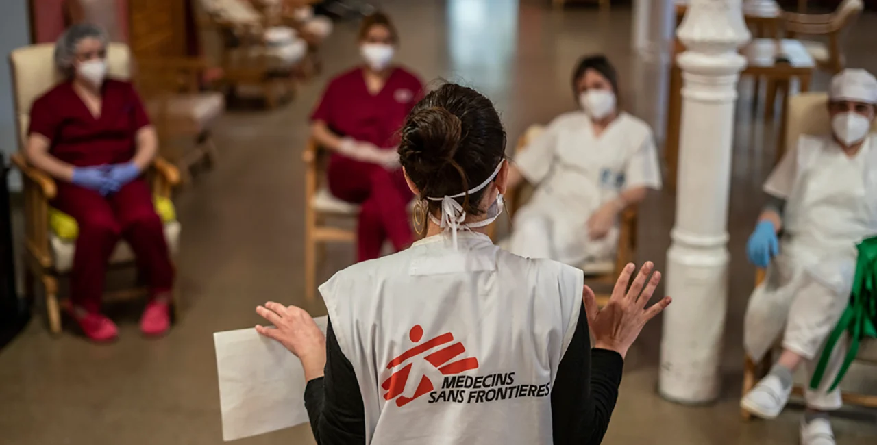 A Doctors Without Borders worker trains nursing home staff in Spain, April 2020 via Doctors Without Borders