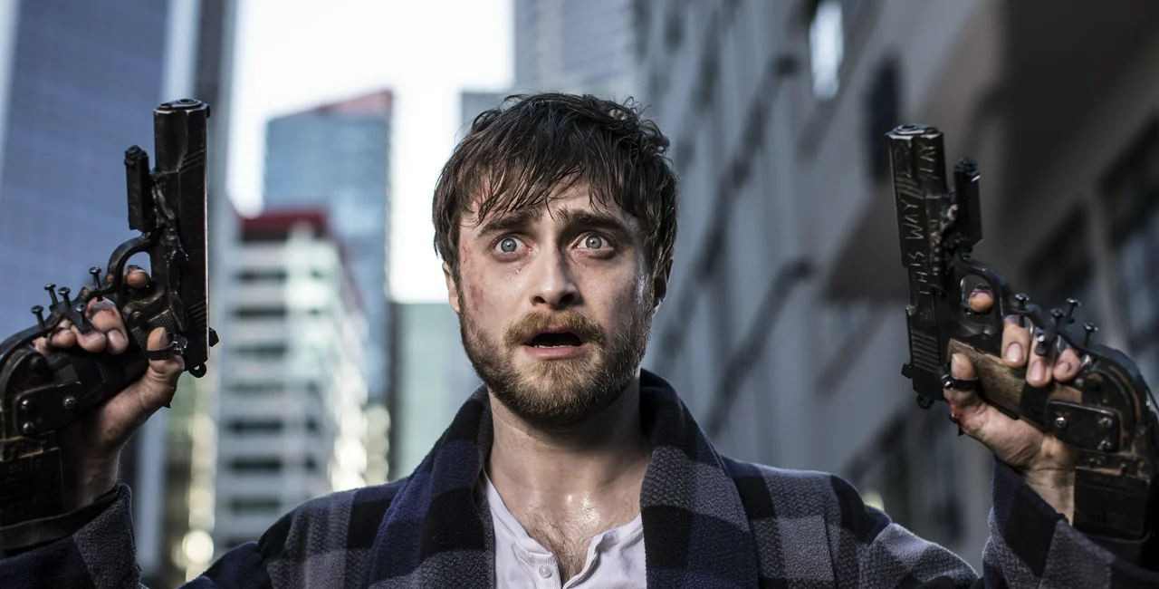 Daniel Radcliffe's character in Guns Akimbo gets intense with guns bolted to his hands. (photo: Madman Entertainment)