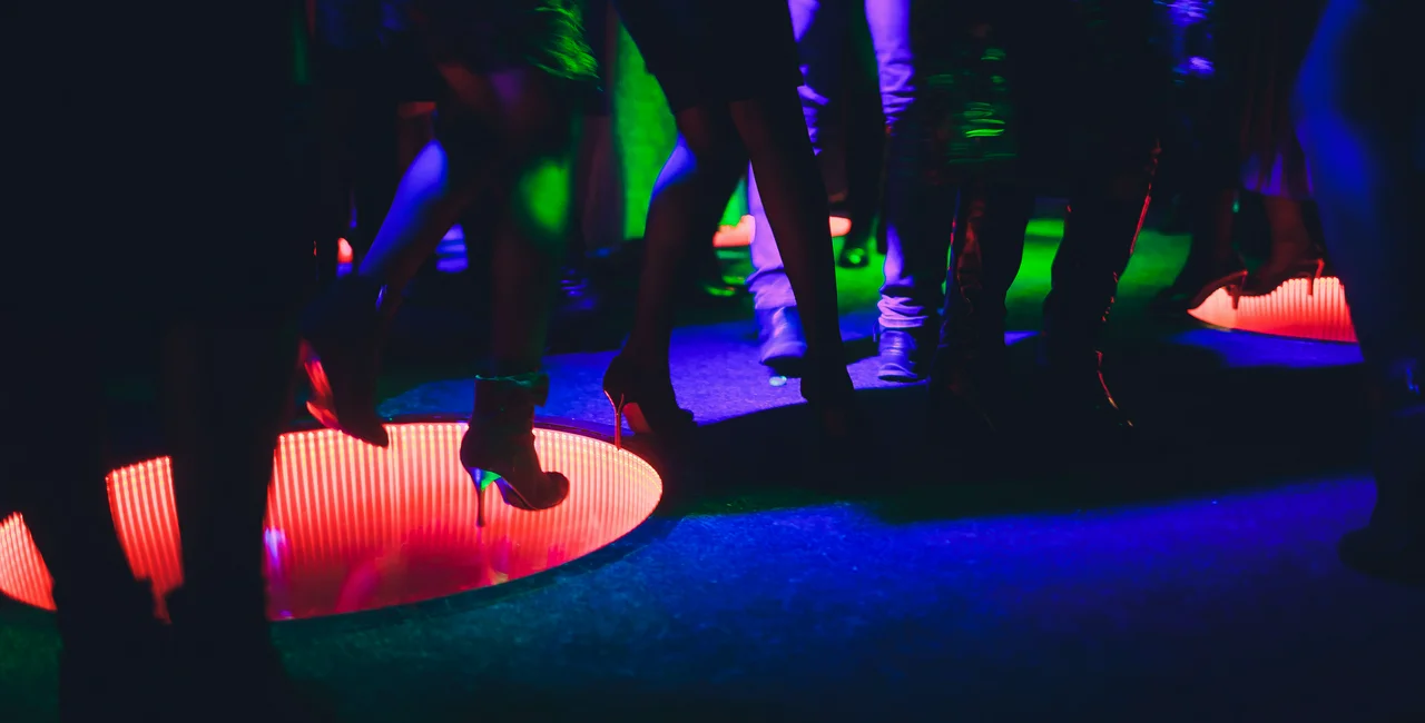 Party dancing in a nightclub via iStock / Vershinin