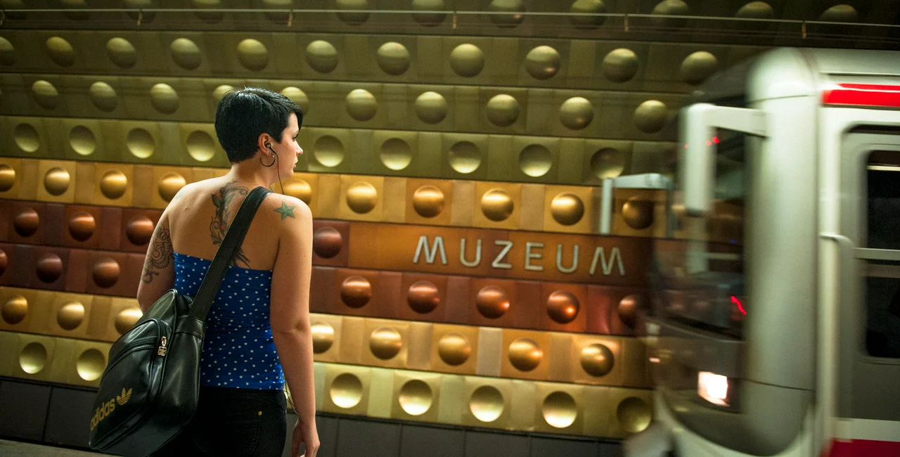Woman waits for Prague metro at Museum station in Prague. (photo: James Fassinger - Expats.cz)