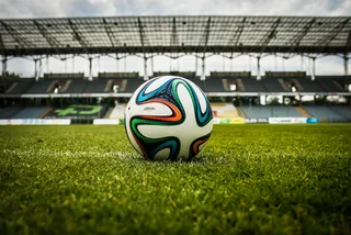 Football in a stadium via Pexels / Pixabay