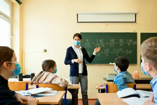 Students in a classroom via iStock / izusek