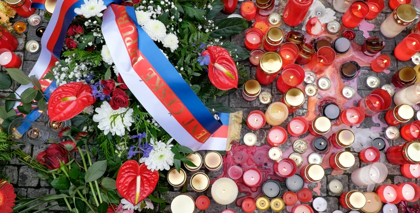 Candles laid in commemoration of the Velvet Revolution at the 1989 memorial on Tuesday. (photo: James Fassinger)