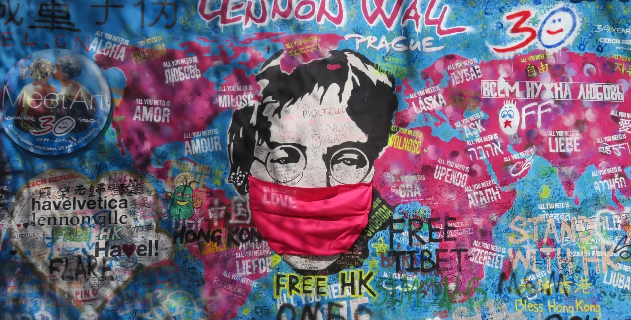 Lennon Wall in April, 2020, featuring a face mask. (photo: Raymond Johnston – Expats.cz)