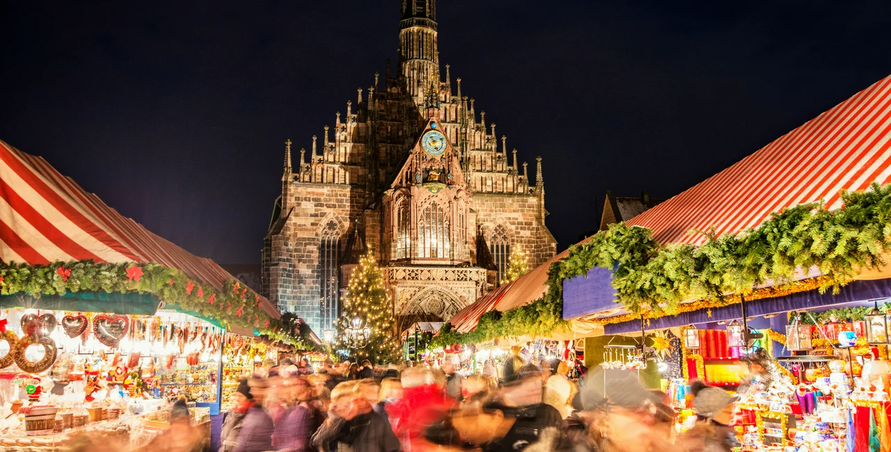 Huge crowd of people moving over Nuremberg´s world-famous Christmas market. (photo: iStock / Juergen Sack)