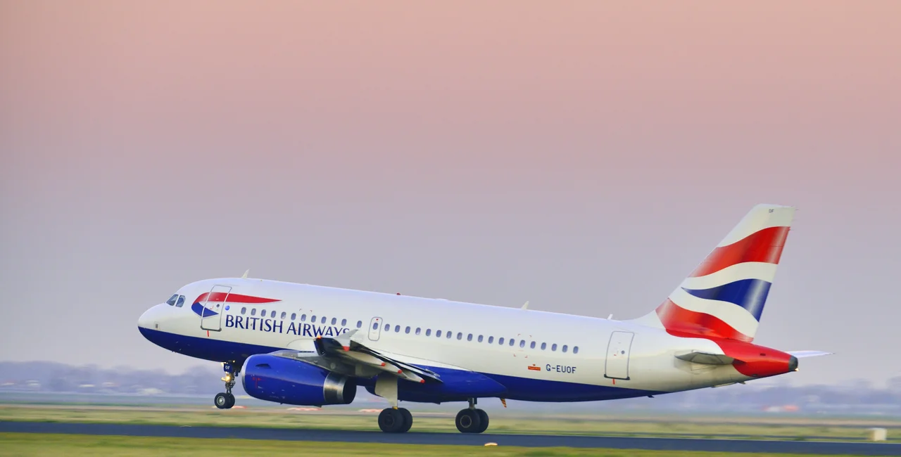 Schiphol, The Netherlands - November 14, 2012: British Airways Airbus A319 taking off from Schiphol airport in a sunset at the end of the day (iStock / 